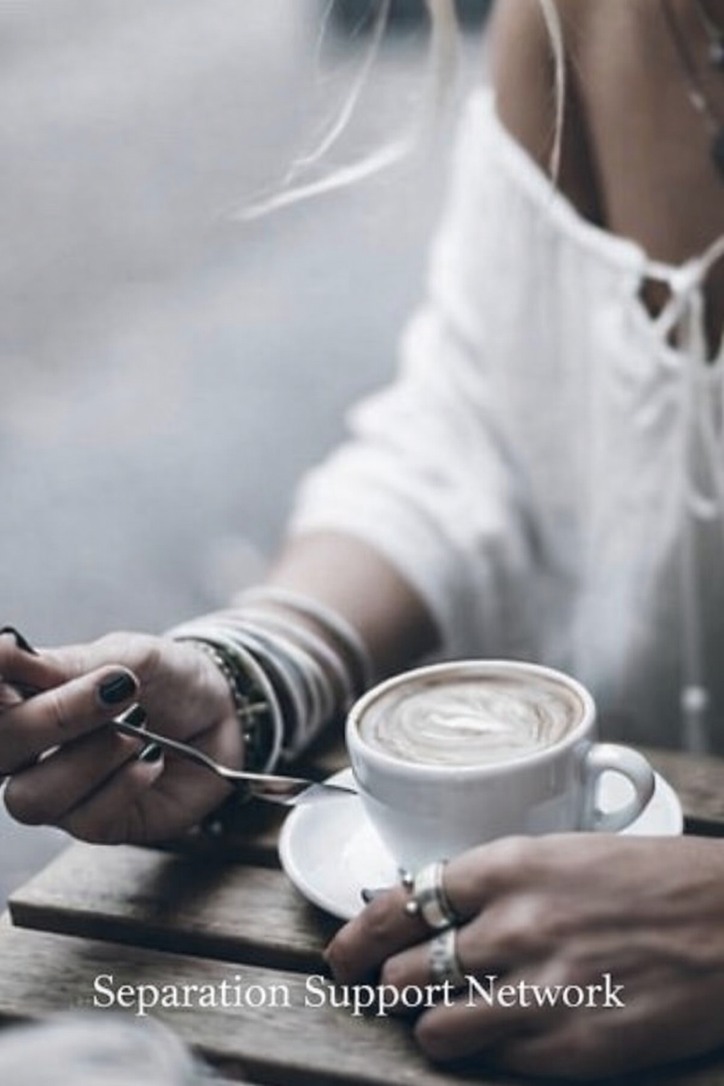 Woman holding a warm coffee — Separation Support Network